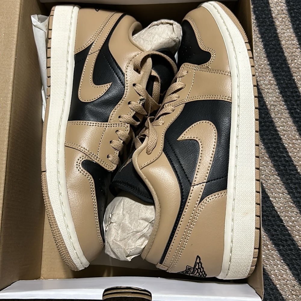 Tan and black Jordan lows